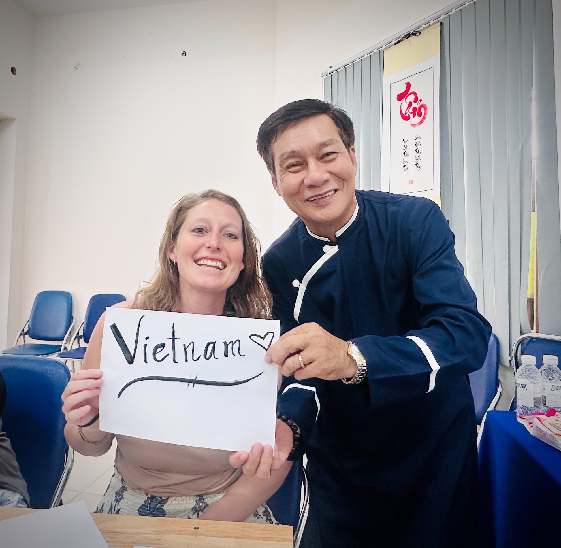  Vietnamese calligraphy artist writing a traditional Vietnamese word